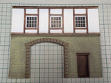 Stone/Half-Timbered Two Storey Building Front With Open Archway